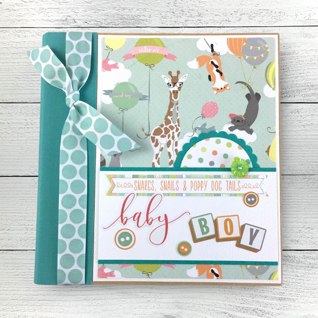 Baby Boy Scrapbook Album with a giraffe, seal, fox, and colorful balloons