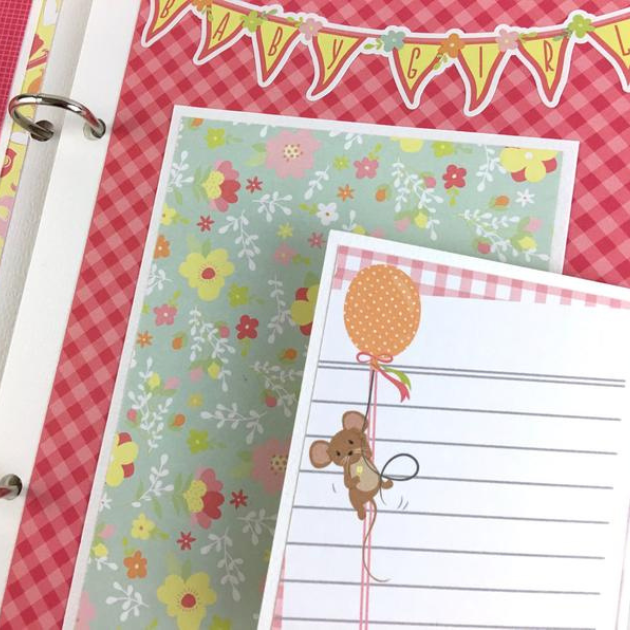 Baby Girl Scrapbook Album Page with a banner, flowers, and a mouse with a balloon