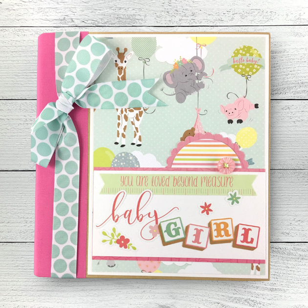 Baby Girl Scrapbook Album with cute animals like a giraffe, elephant, hippo, mouse, and rabbit 