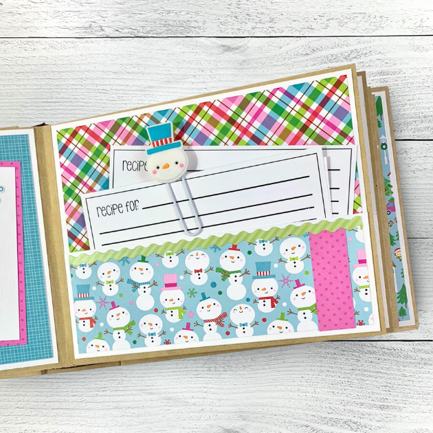 Christmas Recipe Scrapbook Album Page with a pocket, recipe cards, a colorful plaid paper, lots of cute snowmen, and a fun snowman paper clip