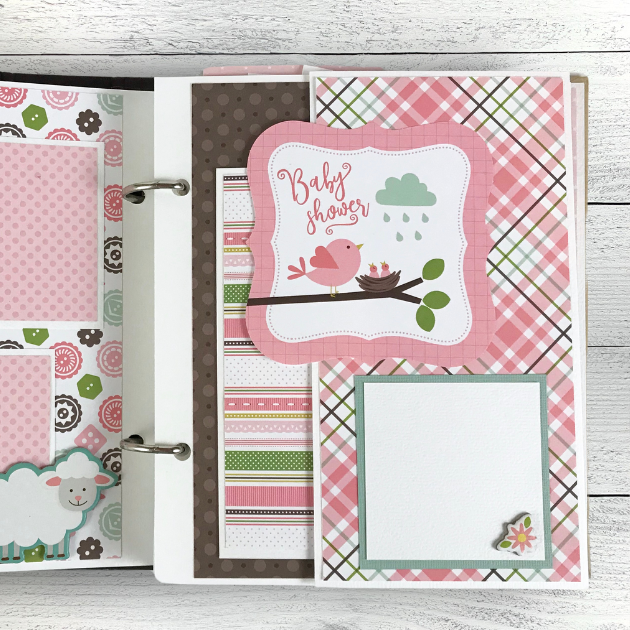 Sweet Baby Girl Scrapbook Album Page with a bird, a nest, a pretty plaid paper, and a folding element