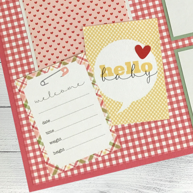 12x12 It's A Girl Baby Scrapbook Page Layout with hearts, a gingham paper, and a cute plaid journaling card with a safety pin