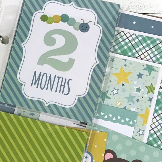 Sweet Baby Boy Scrapbook Page with a 2 month card, stars, an inch worm, and a great green plaid