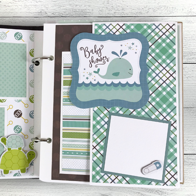 Sweet Baby Boy Scrapbook Page with a whale, a colorful plaid paper, and a folding element