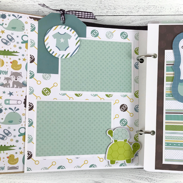 Sweet Baby Boy Scrapbook Album Page with cute rattles, turtles, blue clothes, and polka dots