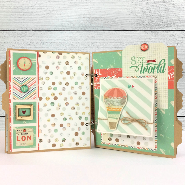 Life Is a Journey Travel Scrapbook Mini Album pages with a hot air balloon, folding card, enamel airplane brad, and a compass rose