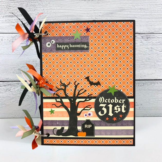 October 31st Halloween Scrapbook Mini Album with cats, bats, pumpkins, headstones, and colorful ribbons