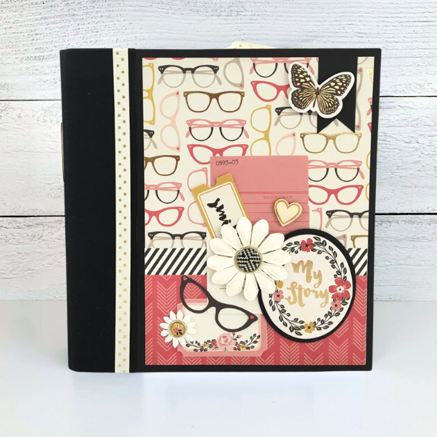 My Story Scrapbook Album with cute pink glasses, flowers, butterflies, and enamel brads