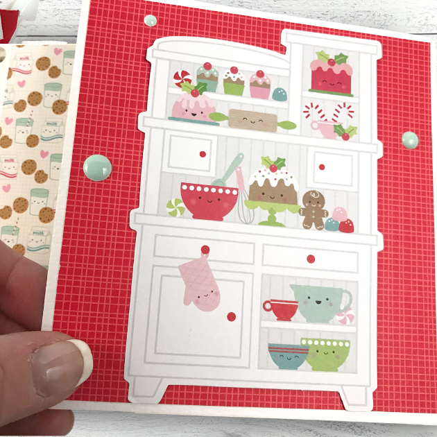 Baking Memories Christmas Scrapbook Album Page with a kitchen hutch filled with cute cupcakes, candies, cakes, and cooking supplies