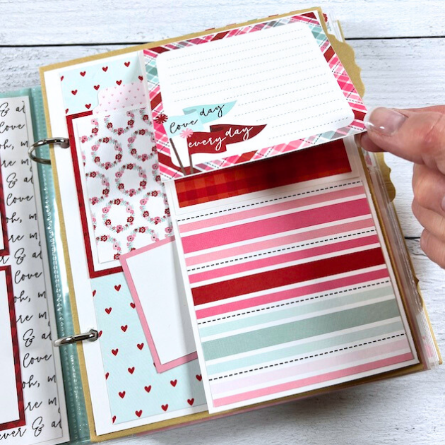 Love is All You Need Scrapbook Album Page with hearts, flowers, stripes, and a journaling card