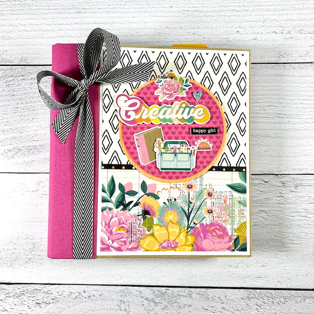 Creative Happy Girl Scrapbook Album with crafting supplies, flowers, and bright happy colors