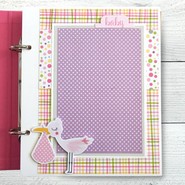 Baby Girl scrapbook album with a stork, a pastel plaid, and  polka dots