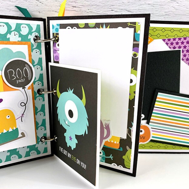 My Favorite Monsters Halloween Scrapbook Album Page with ghosts, a balloon, stars, and silly monsters