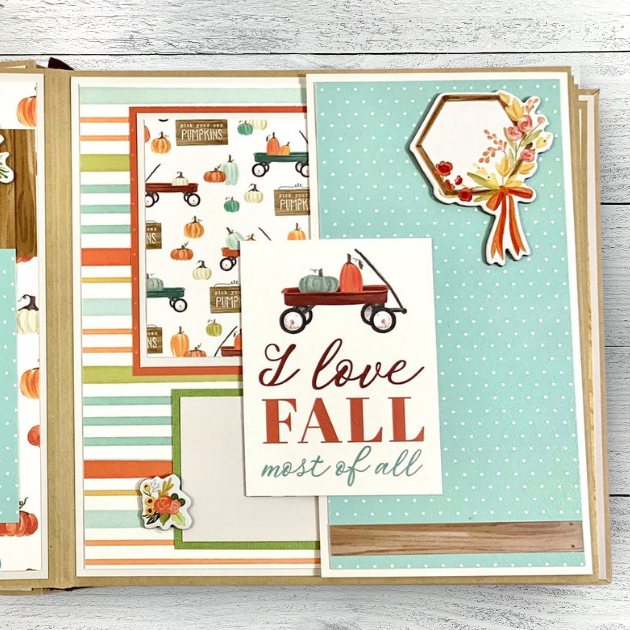 Hello Fall Scrapbook Mini Album page with a fold-out section, pumpkins, wagons, and flowers