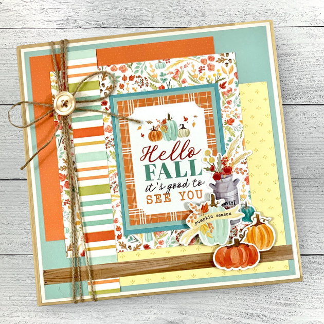 Hello Fall Scrapbook Mini Album with flowers, pumpkins, pretty autumn colors, a twine bow, and button