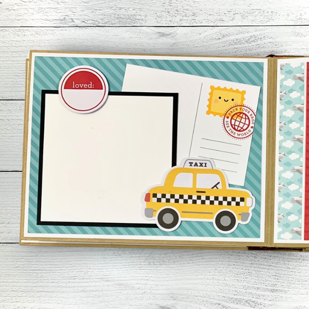 Vacation Memories Travel scrapbook album page with a cute yellow taxi cab, a postcard, and stamps