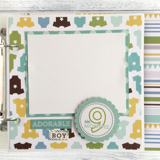 Sweet Baby Boy Scrapbook Album Page with baby clothes, and a 9 month sticker