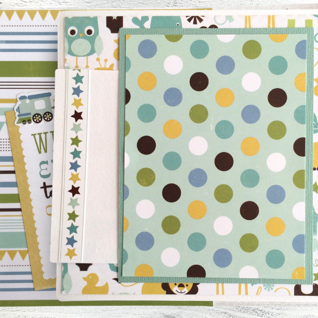 Sweet Baby Boy Scrapbook Album Page with a pocket, cute animals, stars, and polka dots