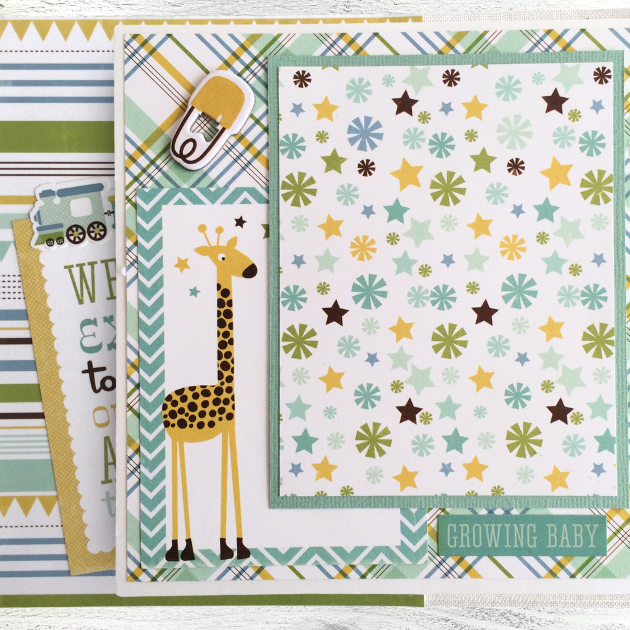 Sweet Baby Boy Scrapbook Album Page with stars, a giraffe, a safety pin, and a plaid paper 