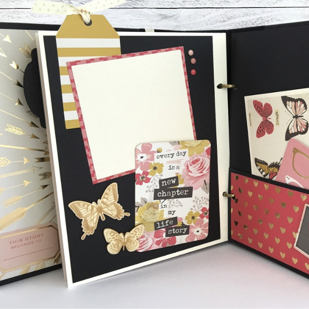 My Story Scrapbook Album Page with butterflies, gold foil, flowers, a tag, ribbon, and enamel dots