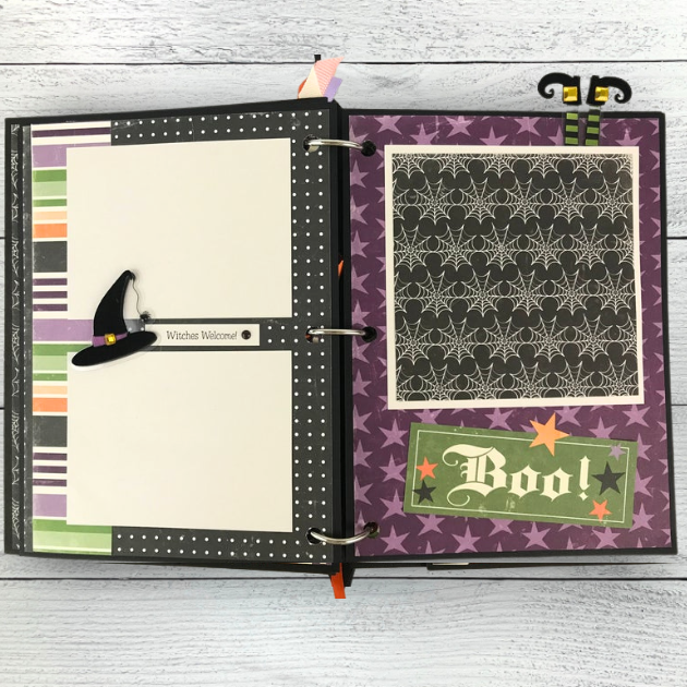 October 31st Halloween Scrapbook Mini Album Pages with a witch's hat and boots, a spider, stars, spider webs, and colorful stripes