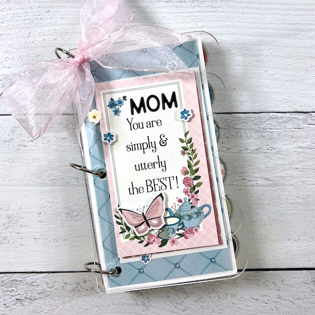 Mother's Day Scrapbook Mini Album with soft pastel colors, flowers, a scallop edge, and a bow