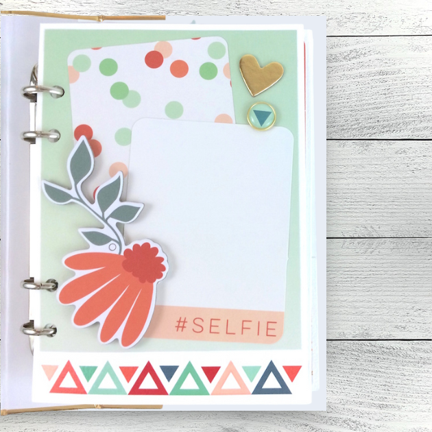 Be Happy Scrapbook Album Page with flowers, polka dots, a heart, an enamel brad, and metallic gold accents