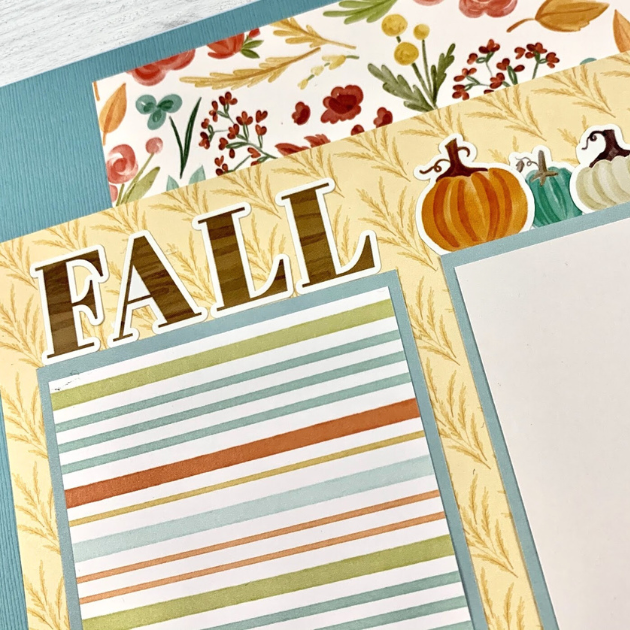 12x12 Fall Memories Scrapbook Page layout with colorful pumpkins, autumn leaves and flowers, and wheat