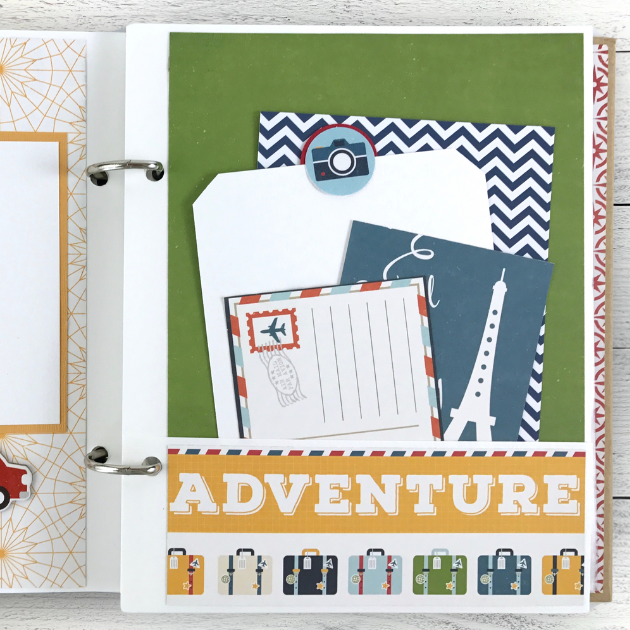 Enjoy The Journey Travel Scrapbook Mini Album with a camera, postcard, luggage, and a pocket with journaling cards