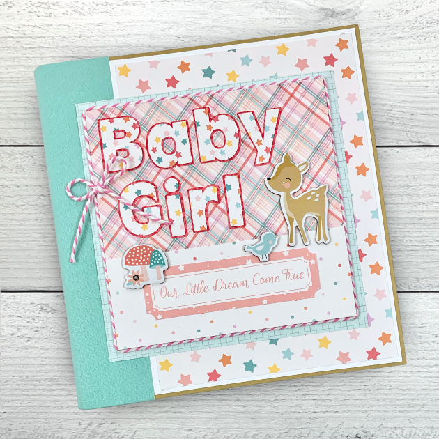 Hello Baby Girl Scrapbook Mini Album with colorful stars, a pink plaid, deer, pretty flowers, mushrooms, and a bow