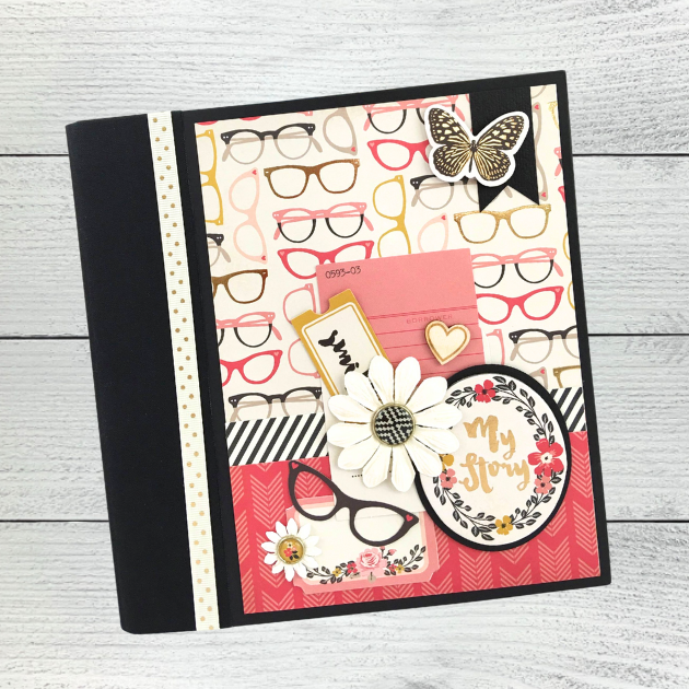 My Story Scrapbook Album with cute pink glasses, flowers, butterflies, and enamel brads