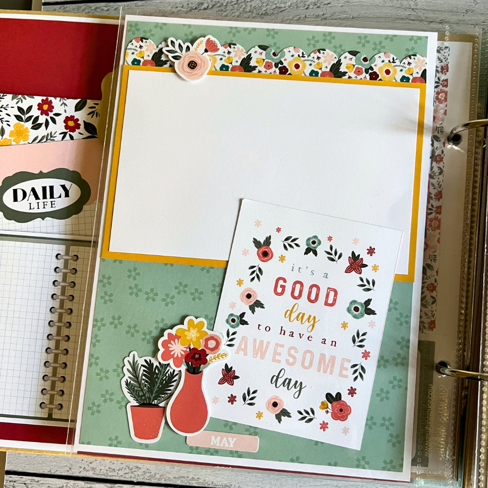 A Year in Review Scrapbook Album Page with flowers, plants, and a photo mat