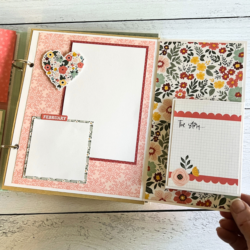 A Year in Review Scrapbook Album Page with flowers, a heart, and a fold-out page