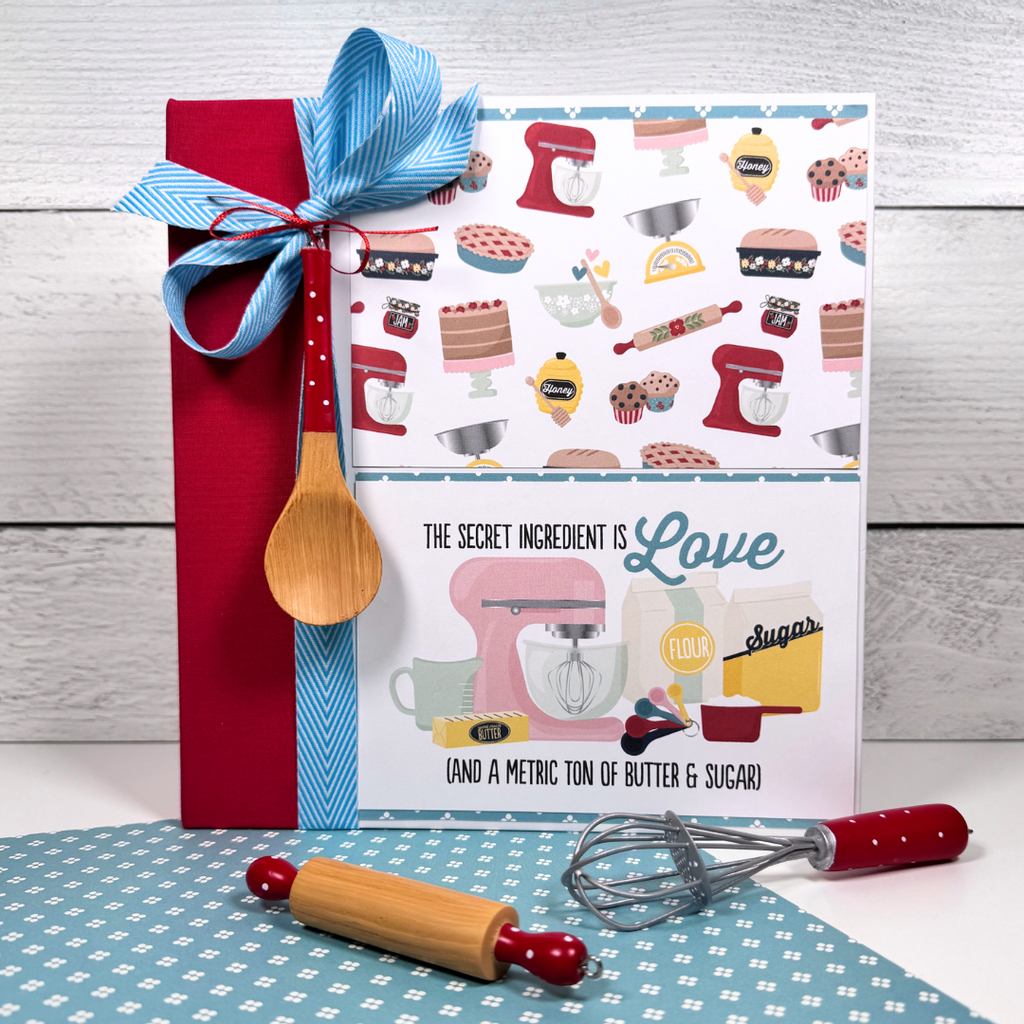Recipe Scrapbook Mini Album with a ribbon, a wooden spoon, bright colors, food, appliances, flowers, and fun kitchen items
