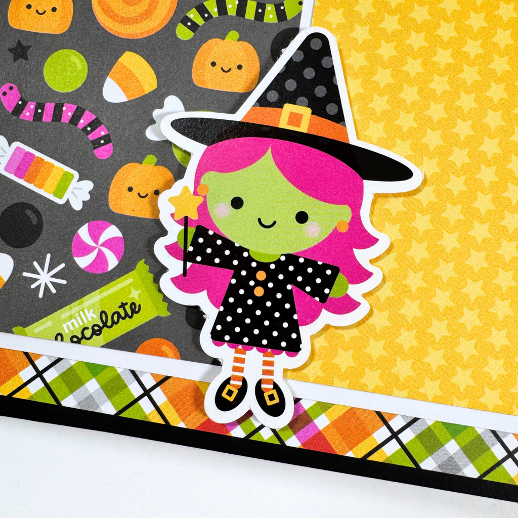 Halloween House Shaped Scrapbook Album Page with a cute witch, lots of colorful candy, stars, and pumpkins