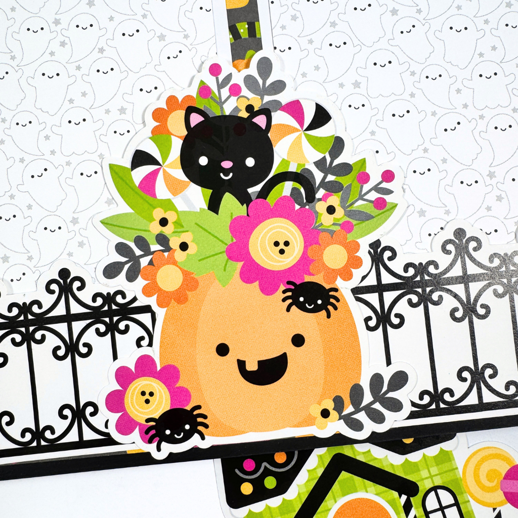 Halloween House Shaped Scrapbook Album Page with a black cat, flowers, a pumpkin, spider, and lots of cute ghosts