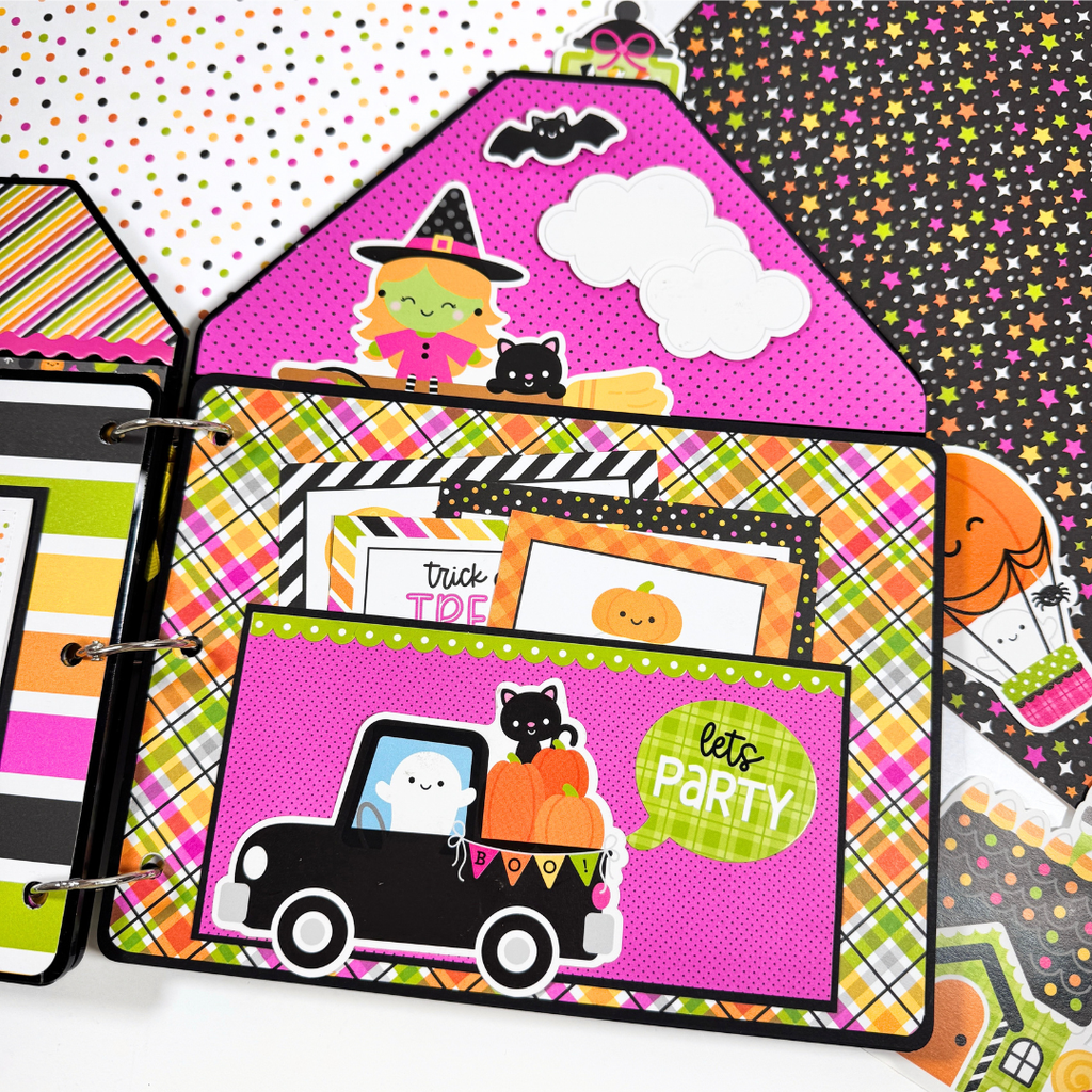 Halloween House Shaped Scrapbook Album Page with a pocket, a pickup truck, a ghost, pumpkins, black cats, a cute witch, and journaling cards 