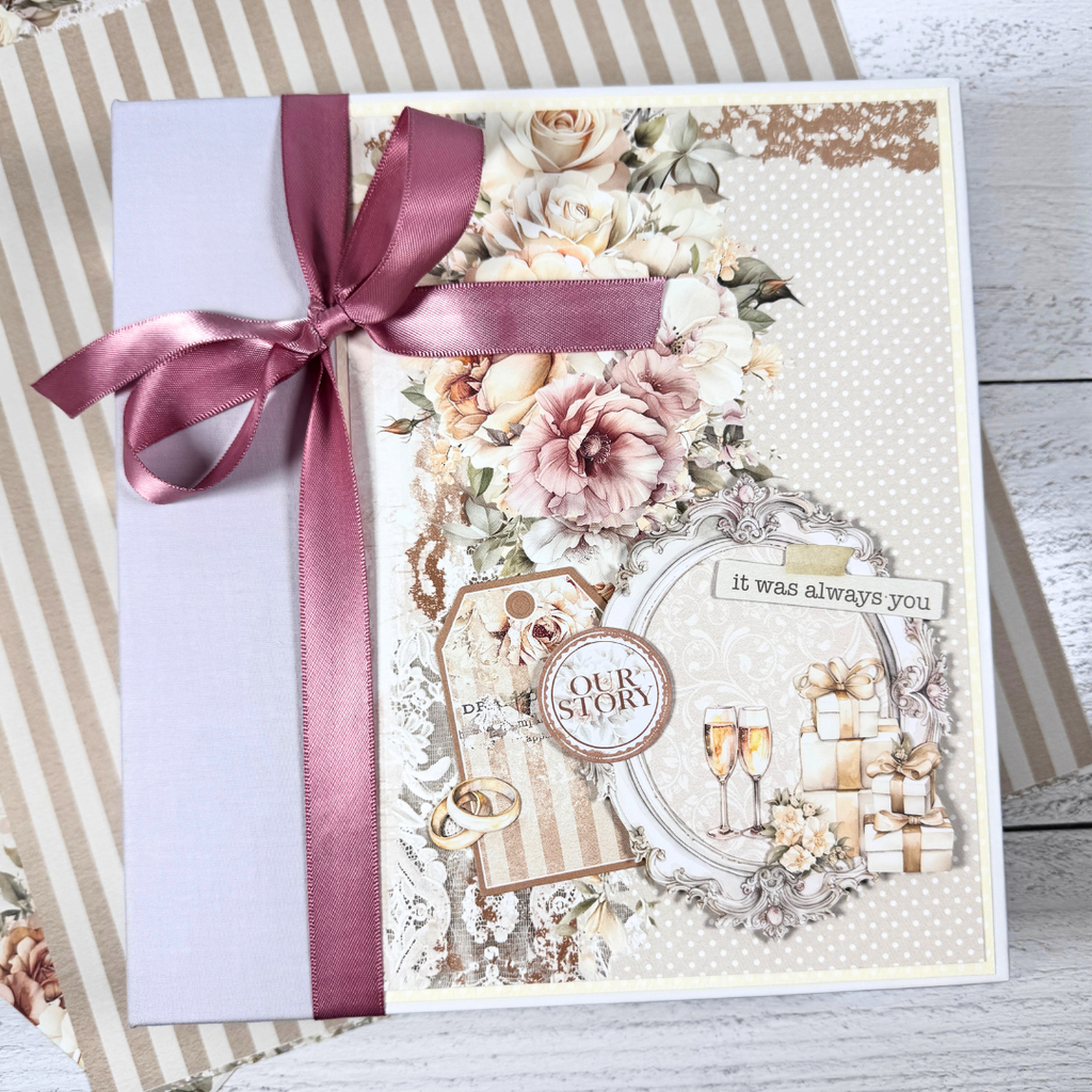 Wedding Scrapbook Mini Album with flowers, champagne glasses, gifts, rings, and a bow