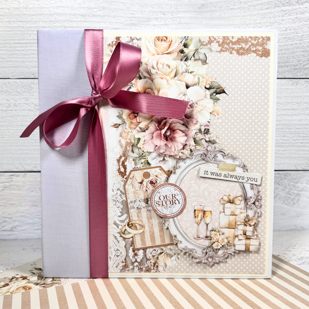 Wedding Scrapbook Mini Album with flowers, champagne glasses, gifts, rings, and a bow