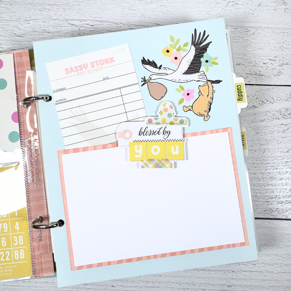 Winnie the Pooh Baby Scrapbook Album Page with a stork, Pooh Bear, flowers, and a library journaling card