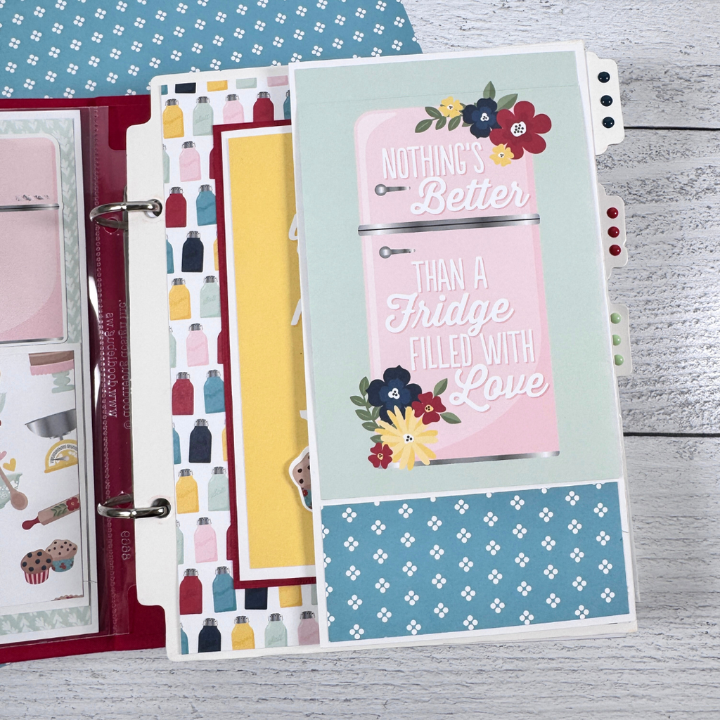 Recipe Scrapbook Album Page with a pink refrigerator, flowers, colorful water bottles, kitchen utensils, and a fold-out element 