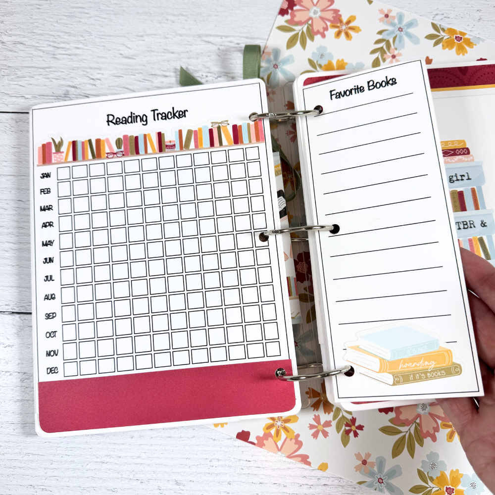 Book Reading Journal Scrapbook Album Page with a row of colorful books and a monthly reading tracker