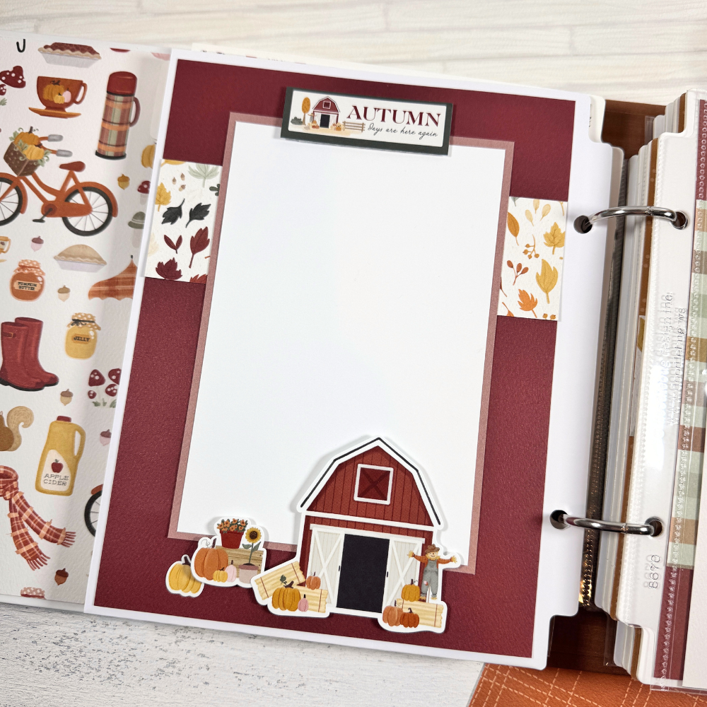 Gather Together Fall Scrapbook Album Page with a barn, colorful leaves, pumpkins, and a large photo mat