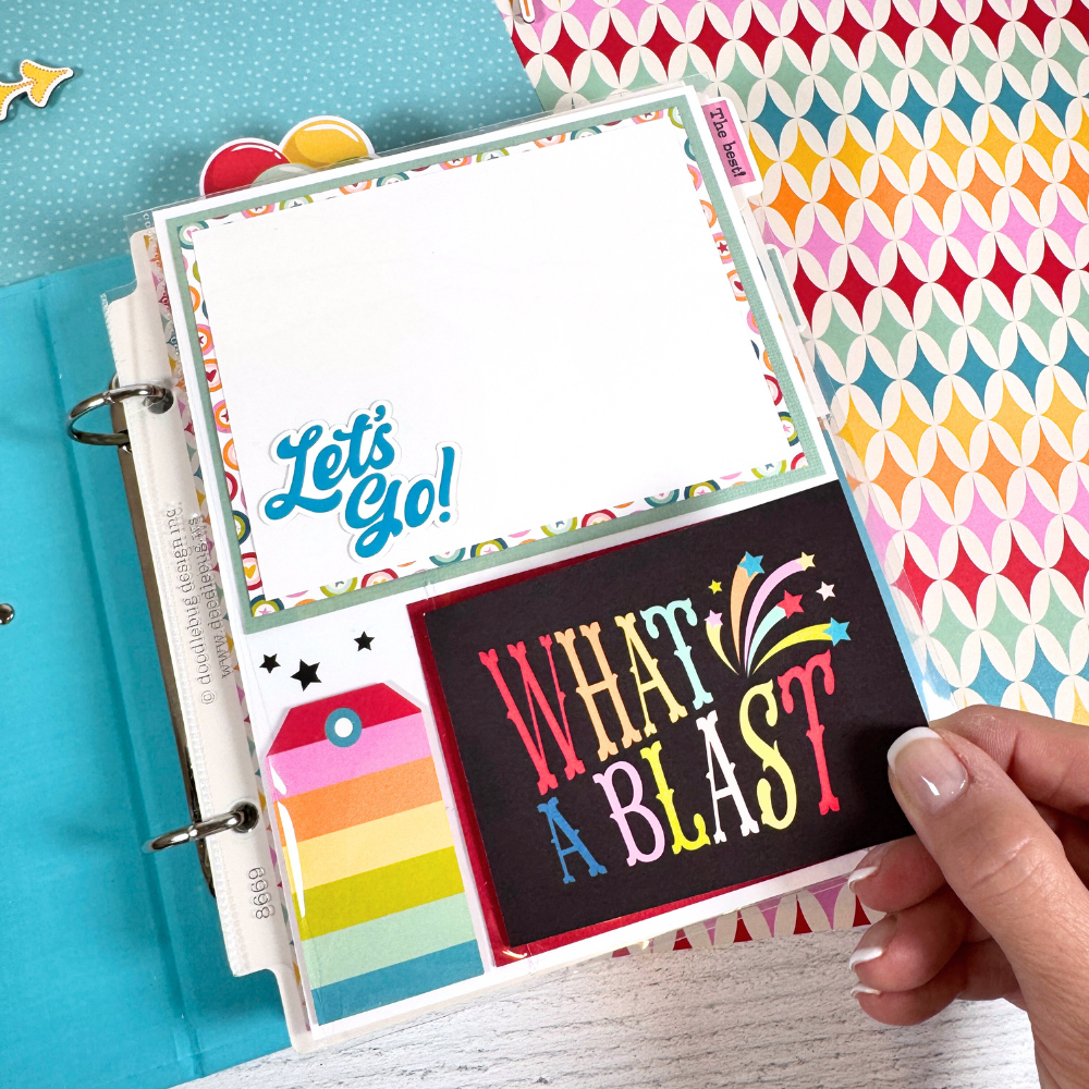 The Best Day Scrapbook Album Page with bright fun colors, stars, a rainbow striped tag, and a flip-up card