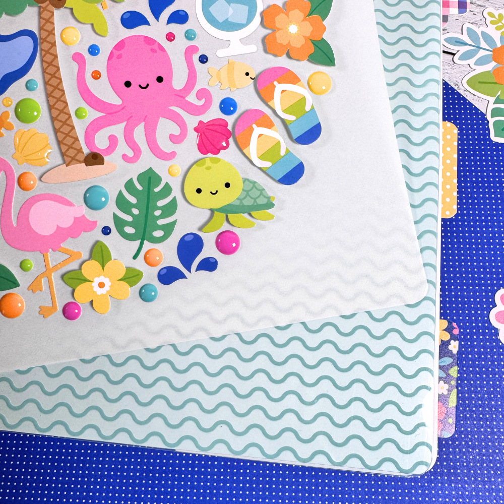 Adventure Awaits Summer Fun Scrapbook Album Page with lots of stickers of seashells, beach items, flowers, waves, and cute sea creatures