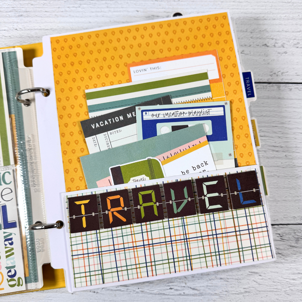 Travel Vibes Scrapbook Mini Album page with a pocket and fun journaling cards tucked inside