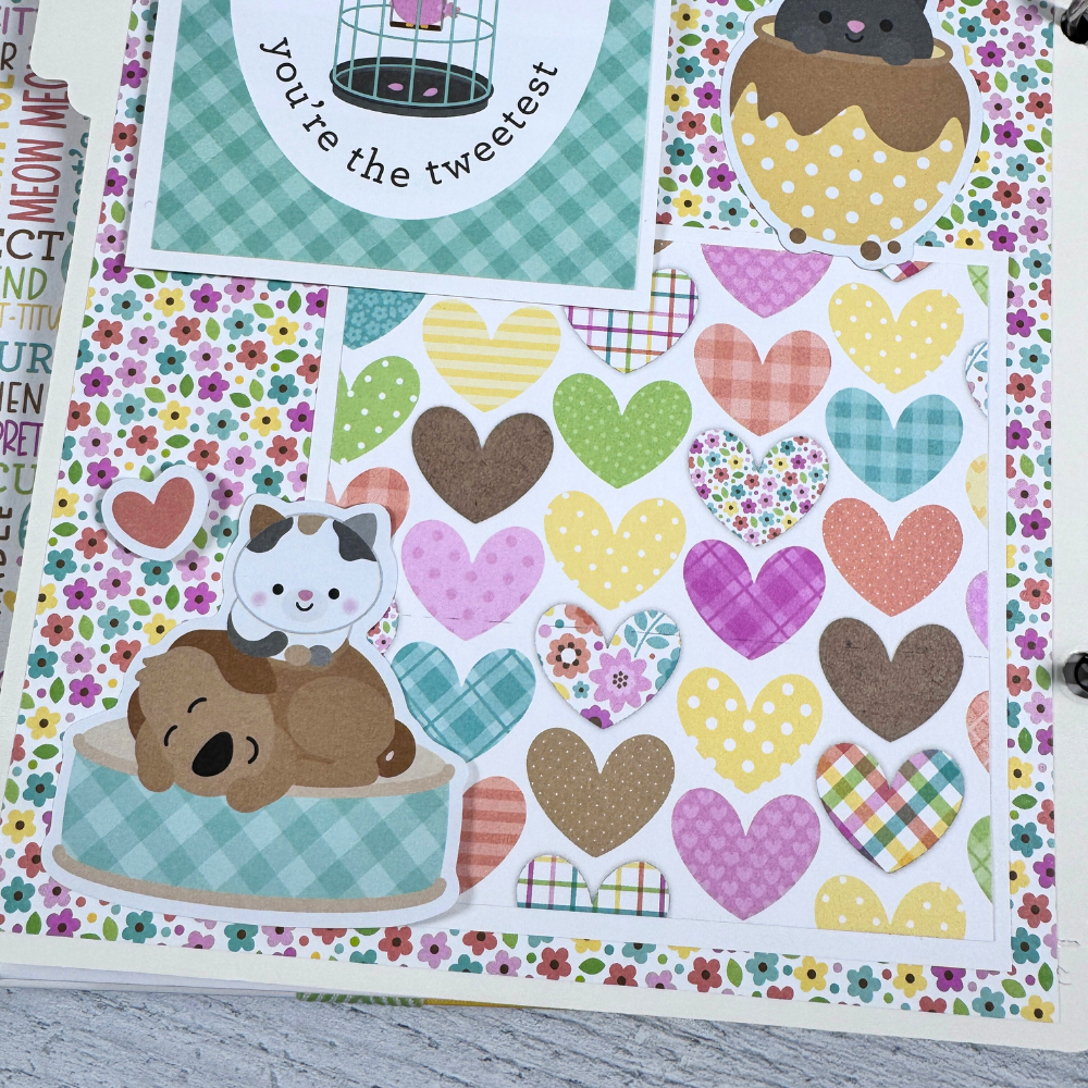 Cat Scrapbook Album page with a cat and a dog napping and lots of colorful flowers and hearts