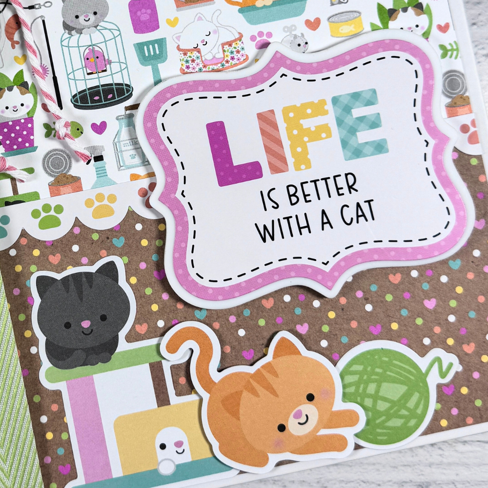 Life is Better With a Cat Scrapbook Album with cute kitty cats, paw prints, and toys