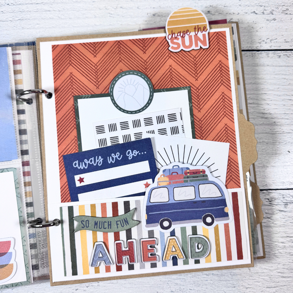 Say Hello To New Adventure Mini Scrapbook Page with the sun, a van with luggage on top, and a pocket with journaling cards