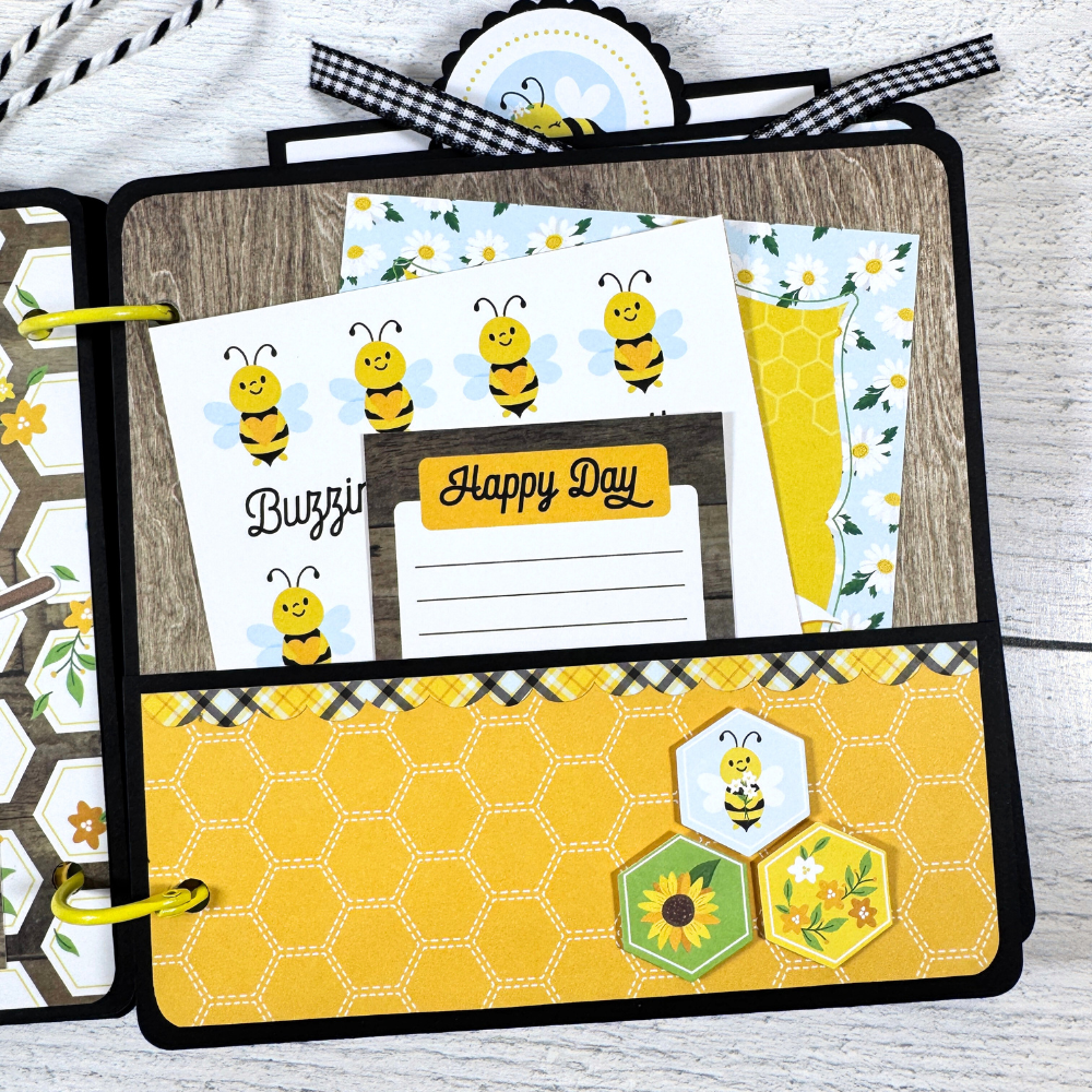 Happy Little Moments Scrapbook Album Page with a pocket, journaling cards with bees and flowers, and a woodgrain paper